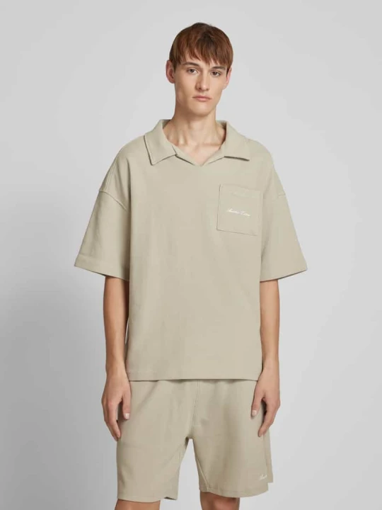 Zdjęcie produktu Koszulka polo o kroju oversized z dekoltem w serek Another Cotton Lab Złamany biały
