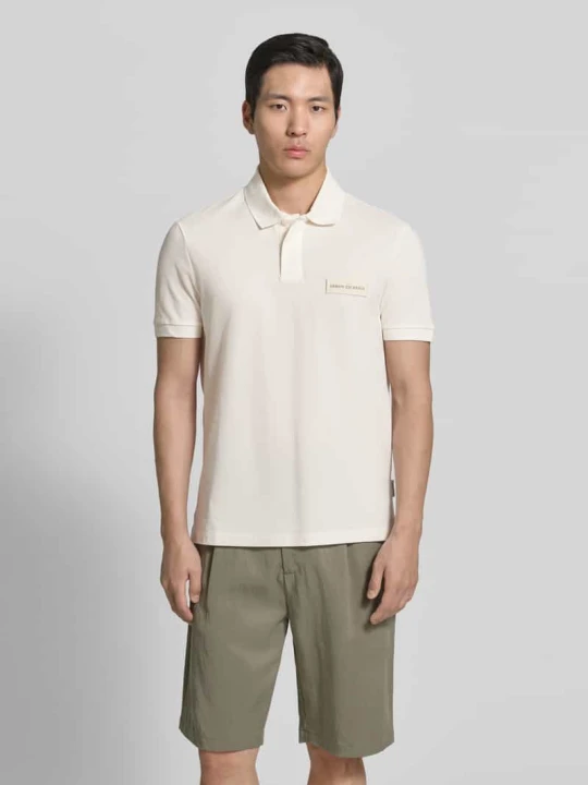 Zdjęcie produktu koszulka polo o kroju regular fit z detalem z logo Armani Exchange Złamany biały