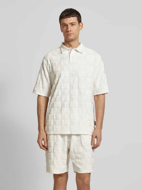 Zdjęcie produktu Koszulka polo o kroju regular fit z listwą guzikową model ‘BEACHWEAR’ Carlo Colucci Złamany biały