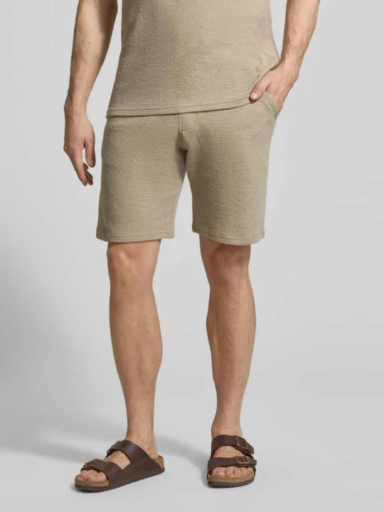 Zdjęcie produktu Koszulka polo o kroju regular fit z mieszanki bawełny MCNEAL Ziemisty brązowy