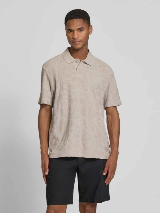 Zdjęcie produktu koszulka polo o kroju regular fit z mieszanki bawełny model 'PE_FLOWER' Boss Piaskowy