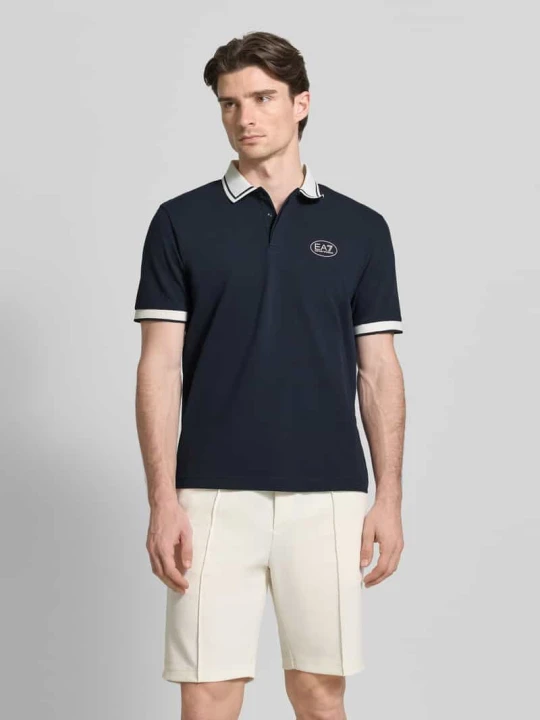 Zdjęcie produktu Koszulka polo o kroju regular fit z nadrukiem z logo EA7 Emporio Armani Ciemnoniebieski