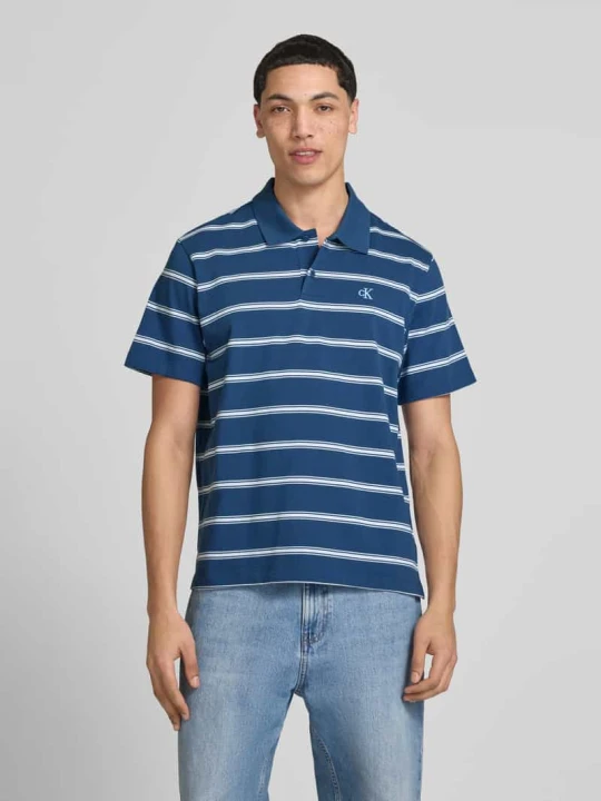 Zdjęcie produktu koszulka polo o kroju regular fit z wyhaftowanym logo Calvin Klein Jeans Granatowy