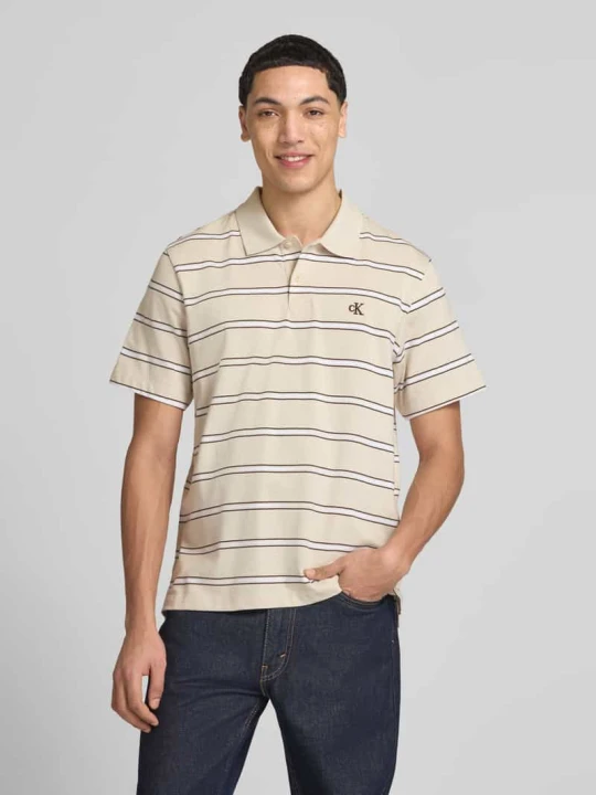 Zdjęcie produktu koszulka polo o kroju regular fit z wyhaftowanym logo Calvin Klein Jeans Beżowy