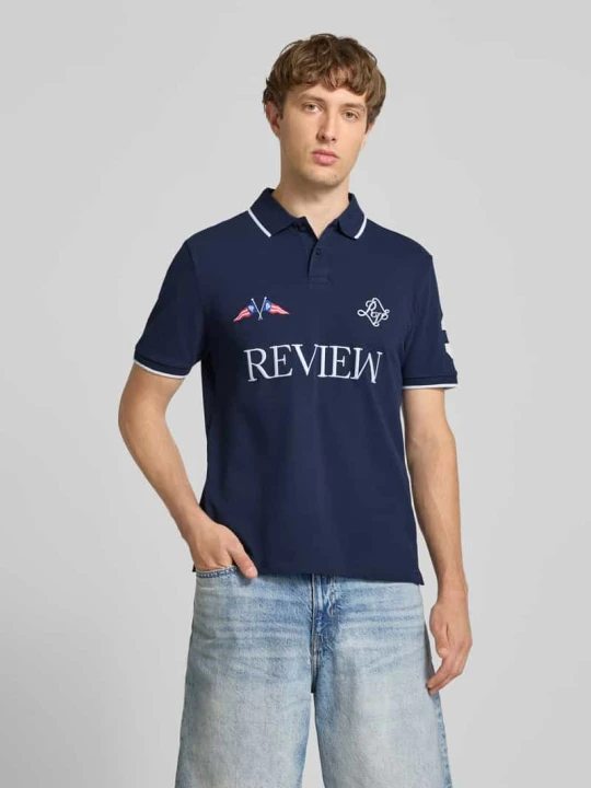 Zdjęcie produktu koszulka polo o kroju regular fit z wyhaftowanym logo model 'Sail' REVIEW Granatowy