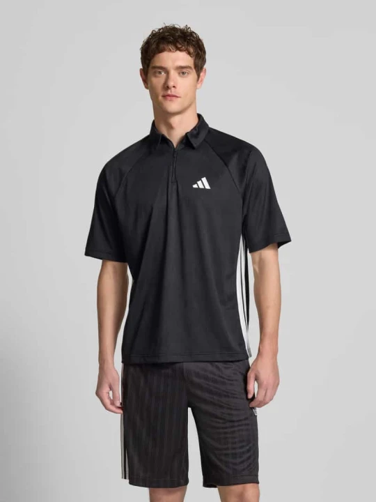 Zdjęcie produktu Koszulka polo o kroju regular fit z zamkiem błyskawicznym Adidas Czarny