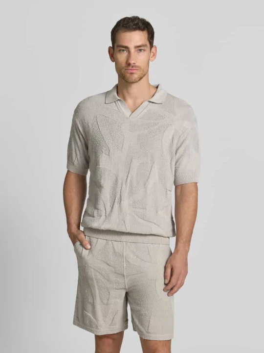 Zdjęcie produktu Koszulka polo o kroju relaxed fit z czystej bawełny model 'ASURFO' Boss Piaskowy