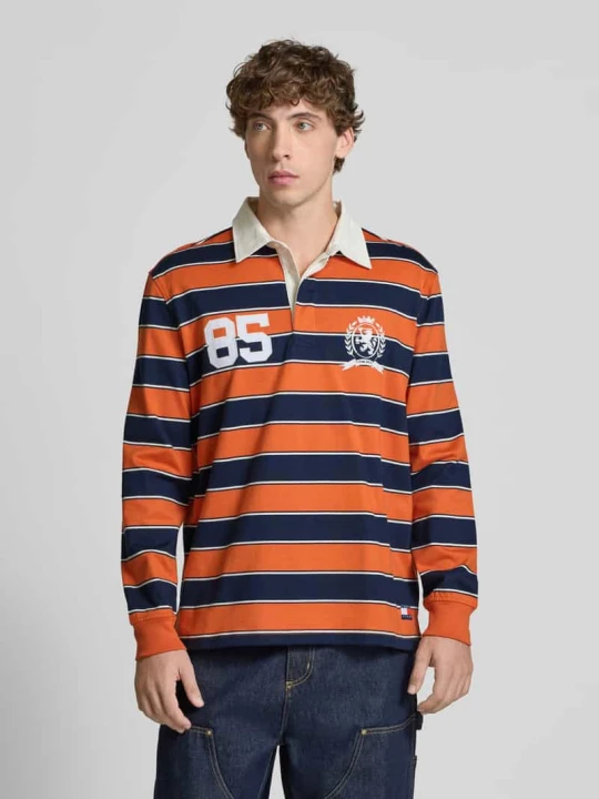 Zdjęcie produktu Koszulka polo o kroju relaxed fit z czystej bawełny Tommy Jeans Pomarańczowy