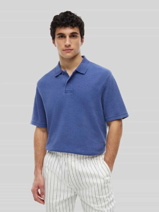 Zdjęcie produktu Koszulka polo o kroju relaxed fit z czystej bawełny Tommy Jeans Niebieski
