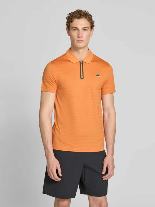 Zdjęcie produktu koszulka polo o kroju slim fit z szybkoschnącego materiału Lacoste Pomarańczowy
