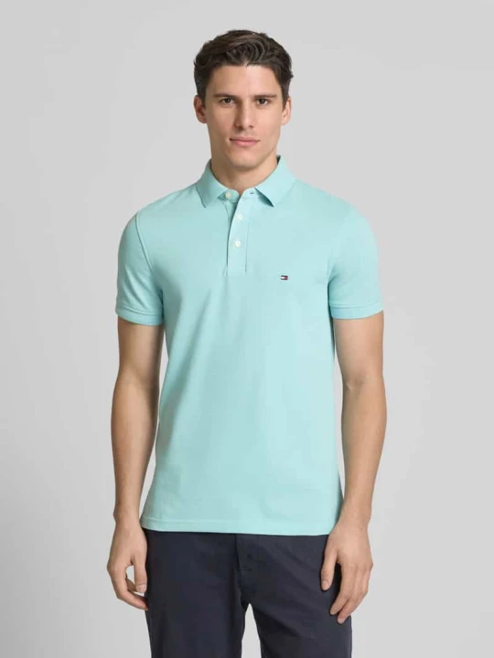 Zdjęcie produktu Koszulka polo o kroju slim fit z wyhaftowanym logo model ‘1985’ Tommy Hilfiger Jasnoturkusowy