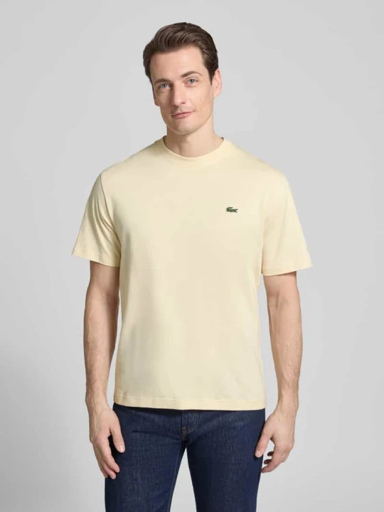Zdjęcie produktu Koszulka polo Regular Fit z czystej bawełny Lacoste Beżowy melanż
