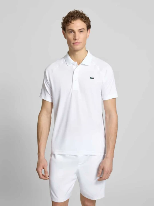 Zdjęcie produktu Koszulka polo sportowa w kroju regular fit z naszywką z logo Lacoste Biały