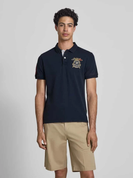 Zdjęcie produktu Koszulka polo w kroju regular fit z naszywkami z logo Superdry Granatowy
