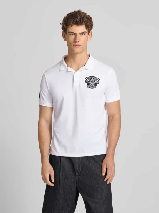 Zdjęcie produktu Koszulka polo w kroju regular fit z naszywkami z logo Superdry Biały