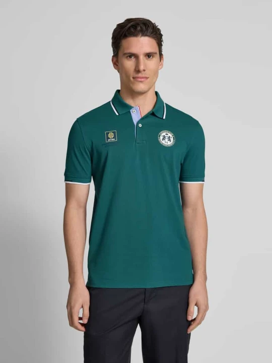 Zdjęcie produktu Koszulka polo z krótką listwą guzikową i nadrukami z logo Christian Berg