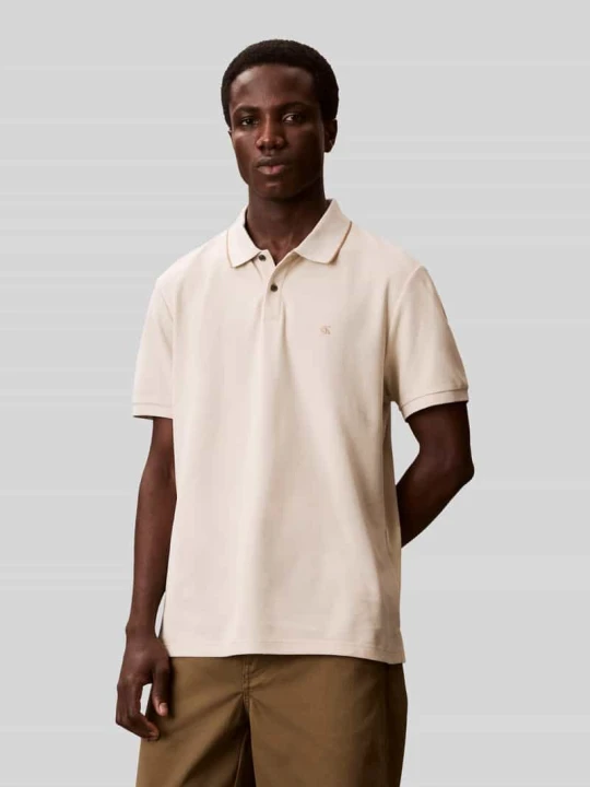 Zdjęcie produktu Koszulka polo z logo w formie haftu z czystej bawełny Calvin Klein Złamany biały