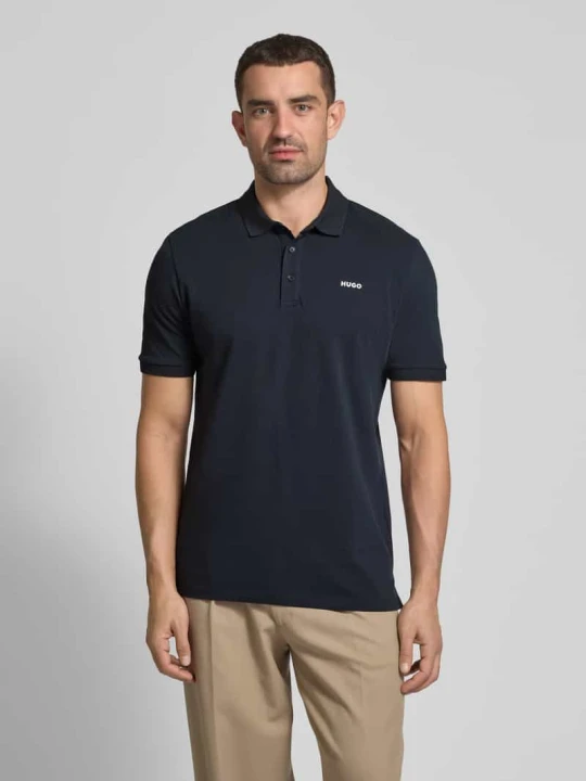 Zdjęcie produktu Koszulka polo z nadrukiem z logo model ‘Donos’ Hugo Ciemnoniebieski