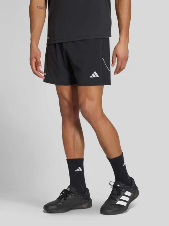 Zdjęcie produktu Koszulka sportowa z kieszeniami zapinanymi na zamek błyskawiczny Adidas Czarny