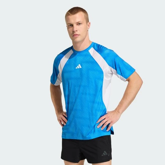 Zdjęcie produktu Koszulka Tech Apparel WC26 Adidas niebieski