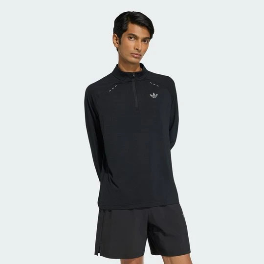 Zdjęcie produktu Koszulka Tech Trefoil Essentials Quarter Zip Adidas czarny