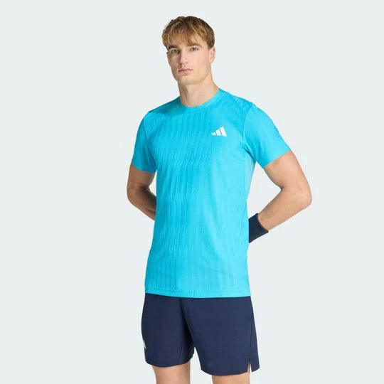 Zdjęcie produktu KOSZULKA TENISOWA CLIMACOOL+ AIRCHILL FREELIFT Adidas Signal Cyan