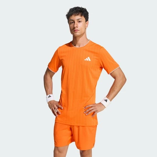 Zdjęcie produktu KOSZULKA TENISOWA CLIMACOOL+ FREELIFT TEE PRO Adidas Pure Orange