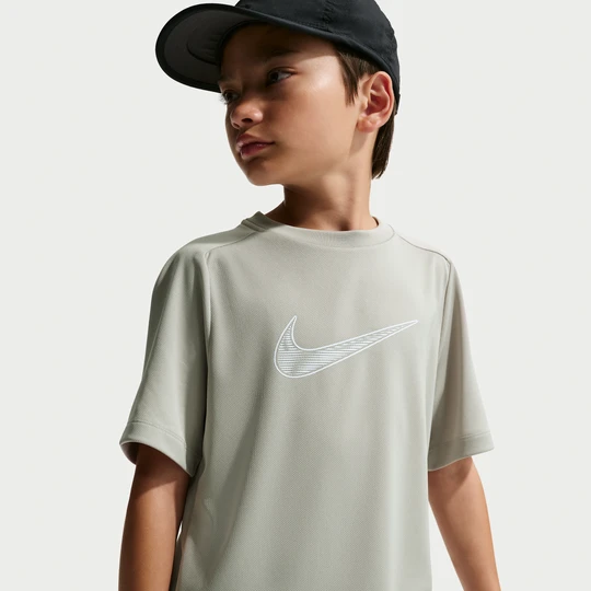 Zdjęcie produktu Koszulka treningowa z krótkim rękawem dla dużych dzieci (chłopców) Dri-FIT Nike Multi - Zieleń