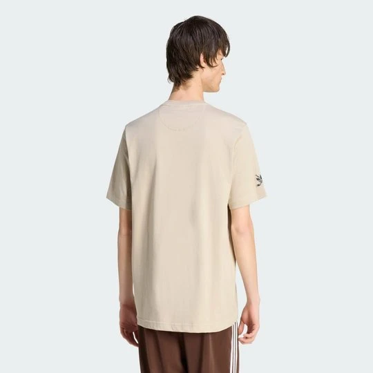 Zdjęcie produktu Koszulka z grafiką Hockey Bear Adidas Wonder Beige