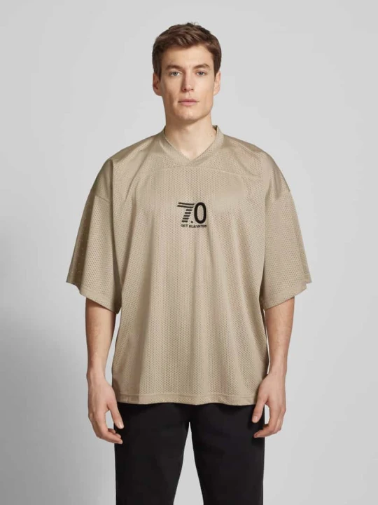 Zdjęcie produktu Koszulka z wyhaftowanym napisem model ‘TRAIN 7.0’ EA7 Emporio Armani Beżowy