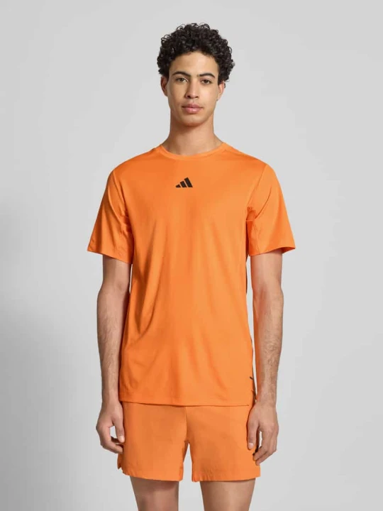 Zdjęcie produktu Krój regular fit Sport Damski t-shirt z Nadruk z logo Adidas Pomarańczowy