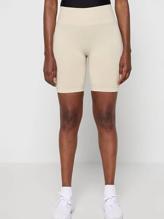 Zdjęcie produktu Legginsy 4F beżowy