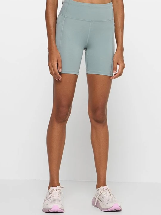 Zdjęcie produktu Krótkie legginsy do biegania Under Armour zielony