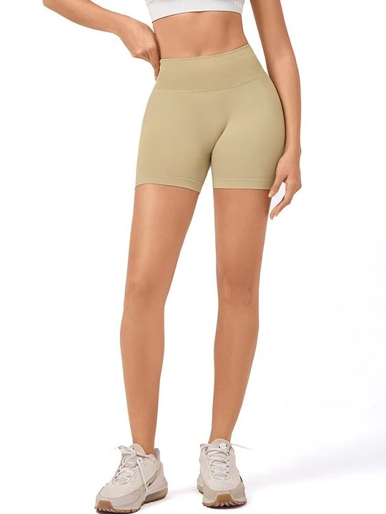 Zdjęcie produktu Krótkie legginsy do biegania YEAZ beżowy