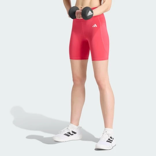 Zdjęcie produktu Krótkie legginsy Optimé Essentials Stash Pocket 7-Inch Adidas Power Pink