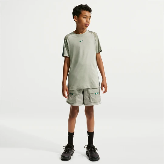 Zdjęcie produktu Krótkie spodenki dla dużych dzieci Nike City Utility - Zieleń