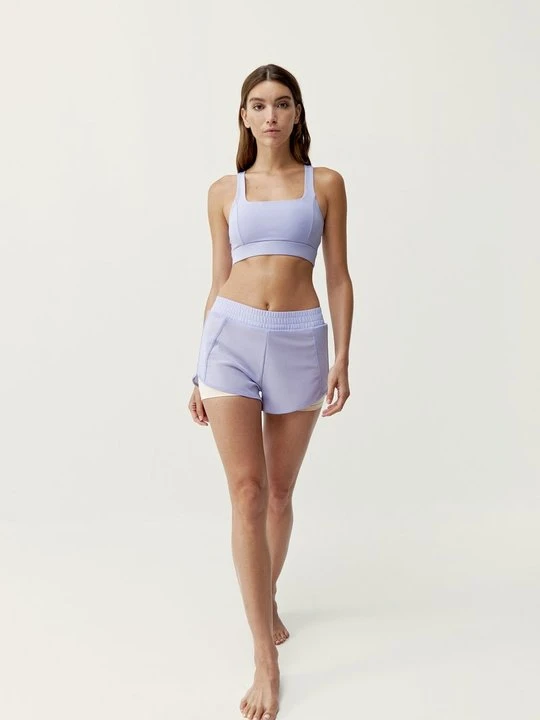 Zdjęcie produktu Krótkie spodenki sportowe Born Living Yoga liliowy