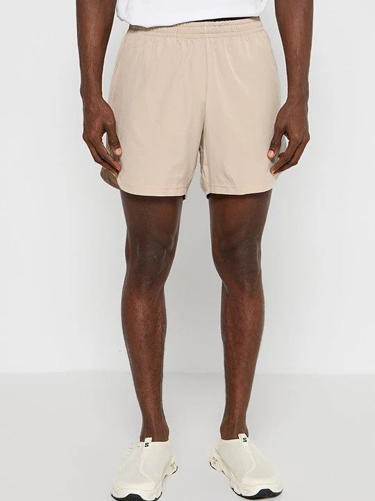 Zdjęcie produktu Krótkie spodenki sportowe EA7 Emporio Armani piaskowy