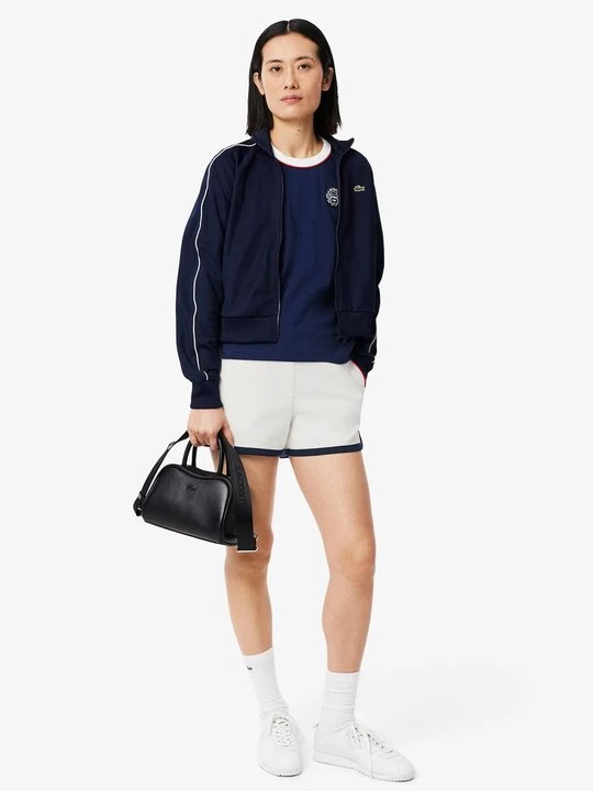 Zdjęcie produktu Krótkie spodenki sportowe Lacoste mleczny