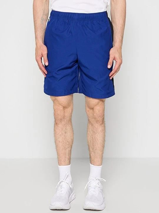 Zdjęcie produktu Krótkie spodenki sportowe Lacoste niebieski