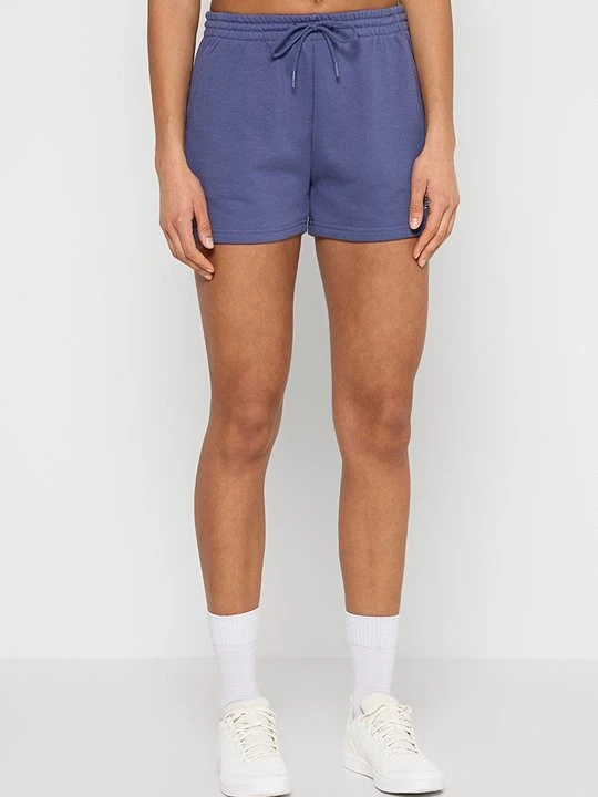Zdjęcie produktu Krótkie spodenki sportowe New Balance fioletowy