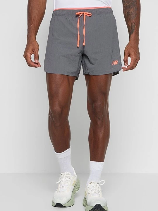 Zdjęcie produktu Krótkie spodenki sportowe New Balance pomarańczowy