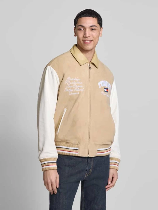 Zdjęcie produktu Kurtka college z prawdziwej skóry o kroju relaxed fit Tommy Jeans Beżowy