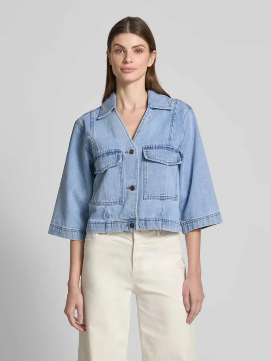 Zdjęcie produktu Bluzka jeansowa z kieszeniami z patką model ‘Amarie’ Moves Jeansowy niebieski