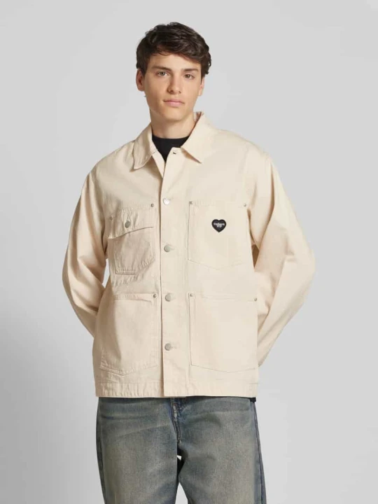 Zdjęcie produktu Kurtka jeansowa z nakładanymi kieszeniami model ‘DREWE CHORE’ Carhartt WIP Złamany biały