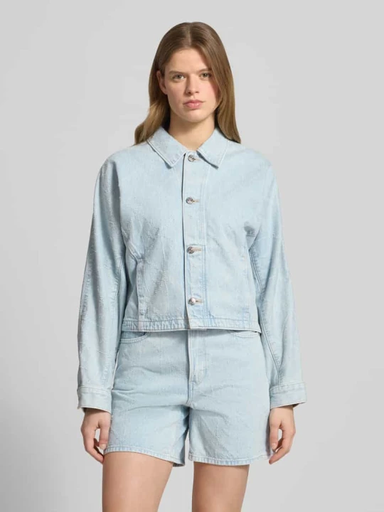 Zdjęcie produktu kurtka jeansowa z wpuszczanymi kieszeniami model 'DOLEMAN TRUCKER' Calvin Klein Jeans Jasnoniebieski