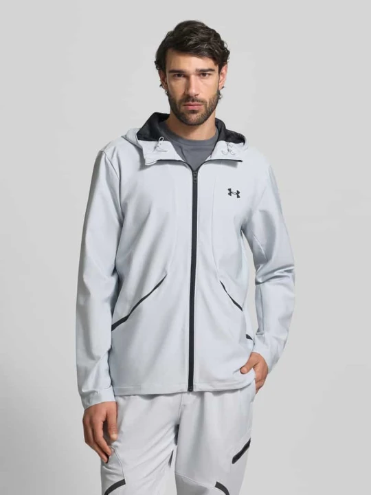 Zdjęcie produktu Kurtka w kroju regular fit z nadrukiem z logo model „Unstoppable” Under Armour Jasnoszary