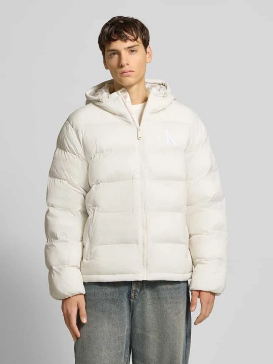 Zdjęcie produktu Kurtka w stylu puffer o kroju regular fit z nadrukiem z logo model 'Monogram' Calvin Klein Jeans Złamany biały