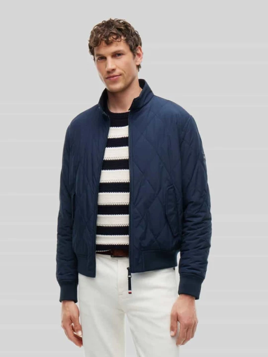 Zdjęcie produktu kurtka pikowana w kroju regular fit z pakowaną kieszenią wewnętrzną Tommy Hilfiger Granatowy