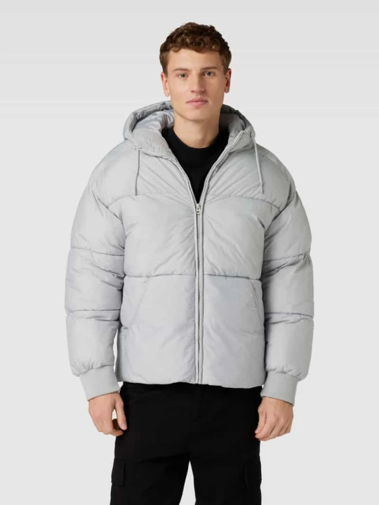 Zdjęcie produktu Kurtka pikowana z kapturem model ‘SURFACE’ Jack&Jones Jasnoszary